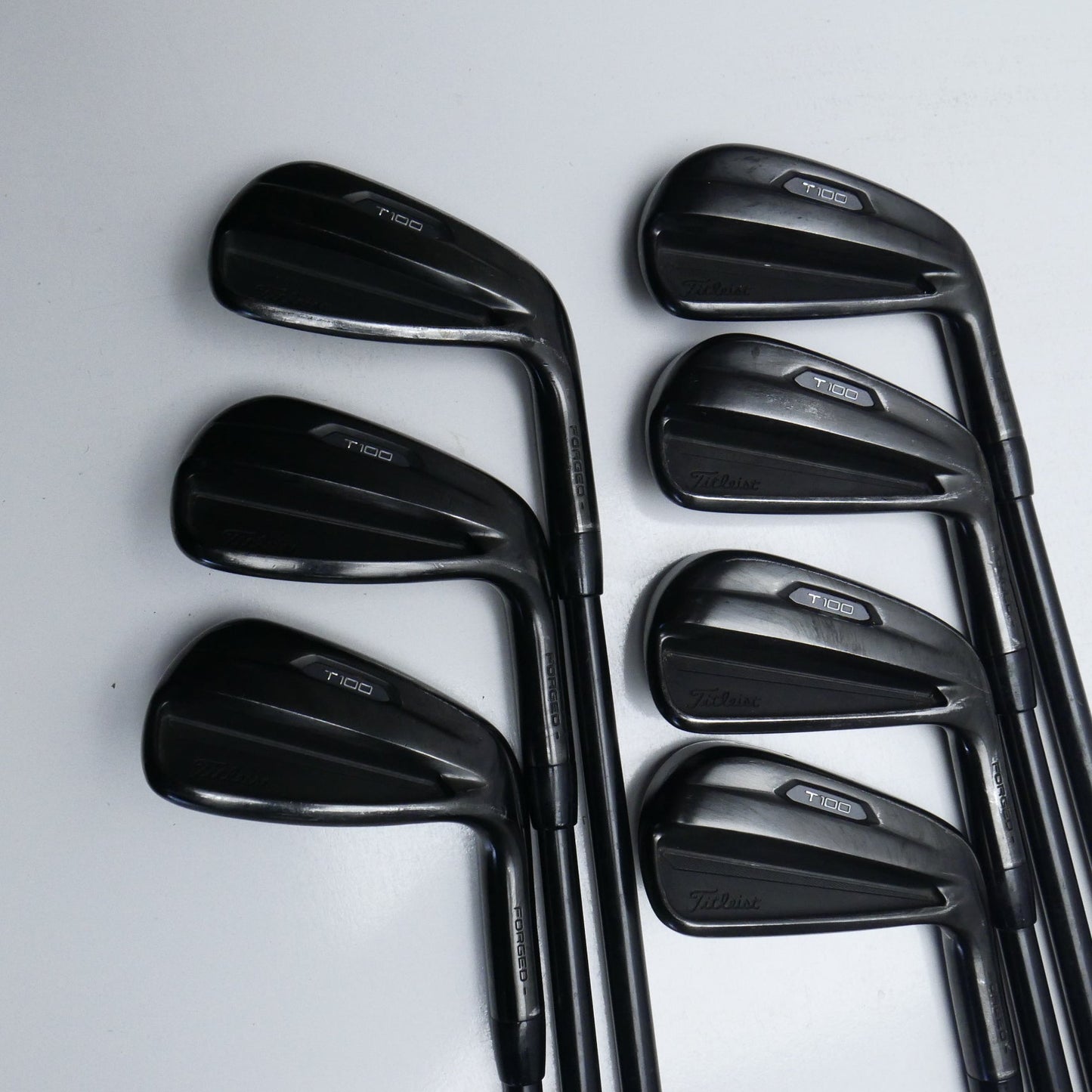 Used Titleist T100 2021 Black Iron Set / 4 - PW / Stiff Flex