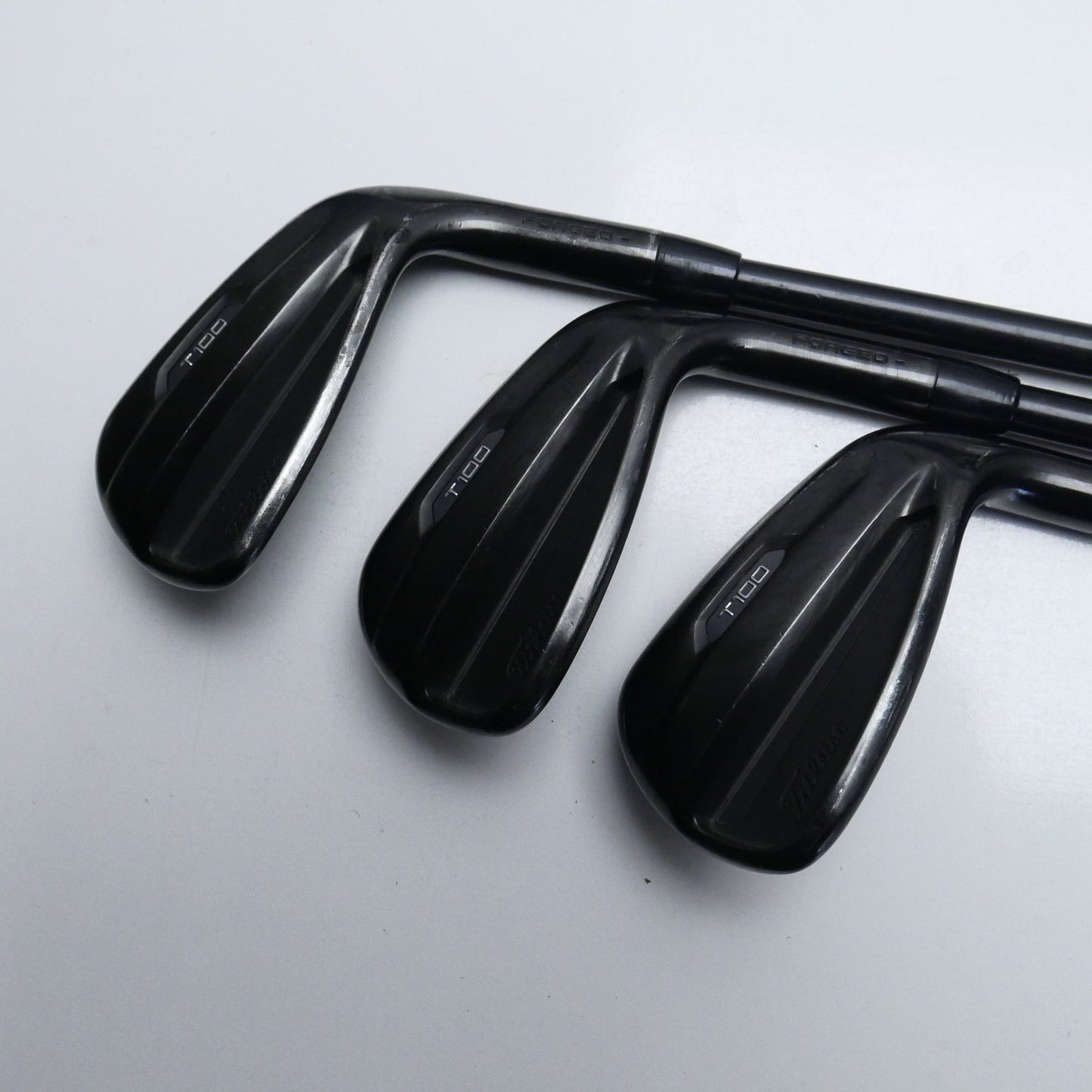 Used Titleist T100 2021 Black Iron Set / 4 - PW / Stiff Flex