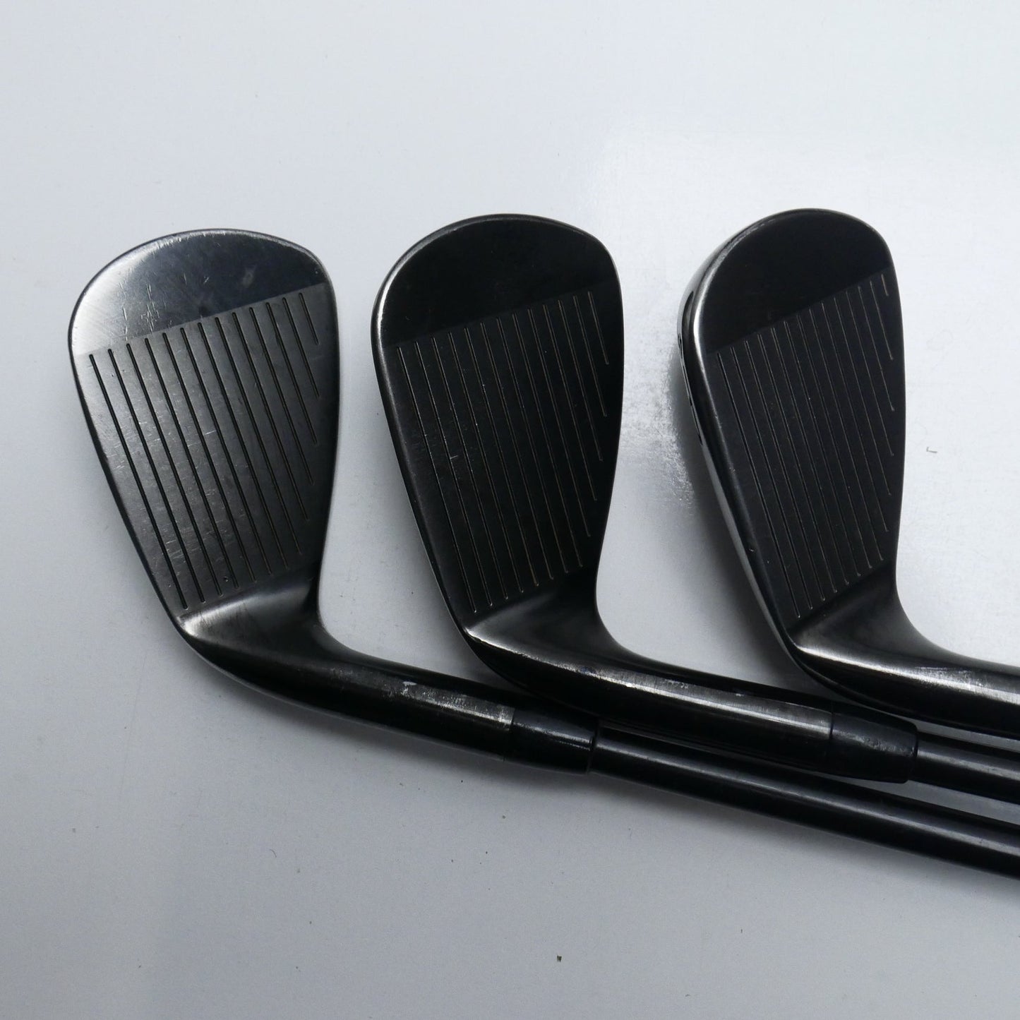 Used Titleist T100 2021 Black Iron Set / 4 - PW / Stiff Flex